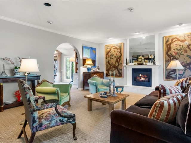 140 Fairway Dr, Missoula, MT 59803 - carpeted living room featuring ornamental molding, arched walkways, and a large fireplace