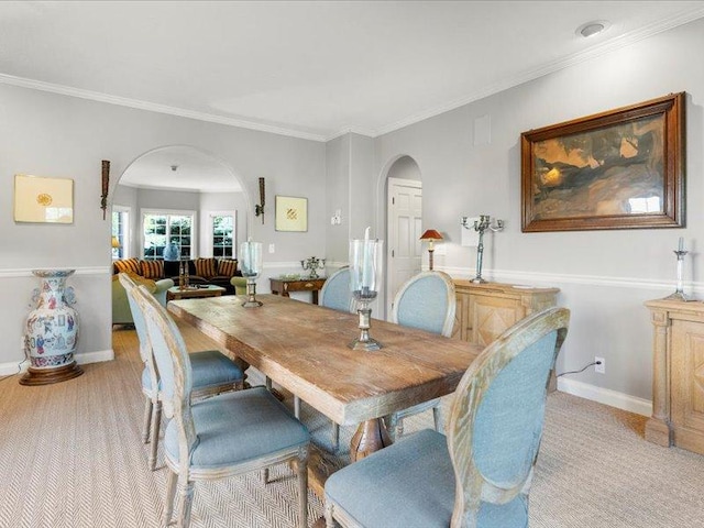 140 Fairway Dr, Missoula, MT 59803 - dining room with arched walkways, light colored carpet, and crown molding