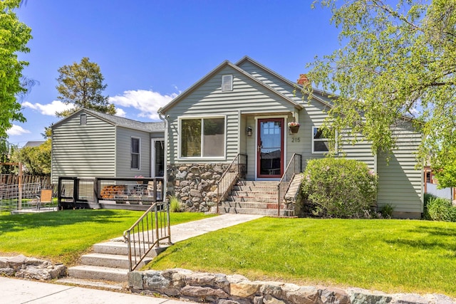 215 N Oak St, Townsend, MT 59644 - view of front of home featuring a chimney and stone siding
