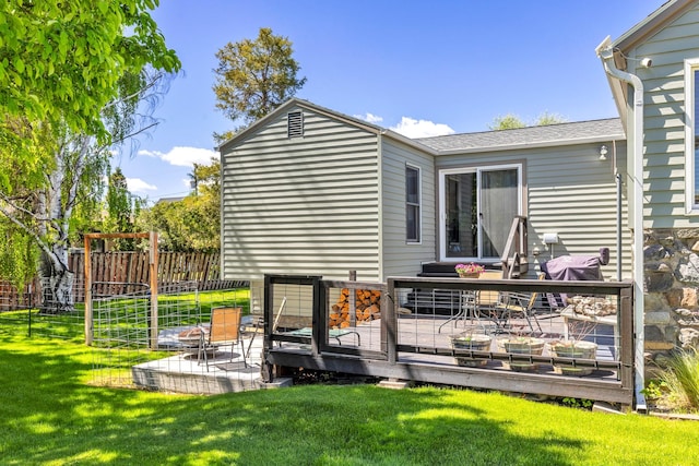 215 N Oak St, Townsend, MT 59644 - back of property with a deck and roof with shingles