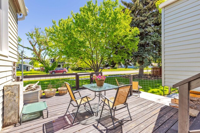215 N Oak St, Townsend, MT 59644 - deck with a lawn