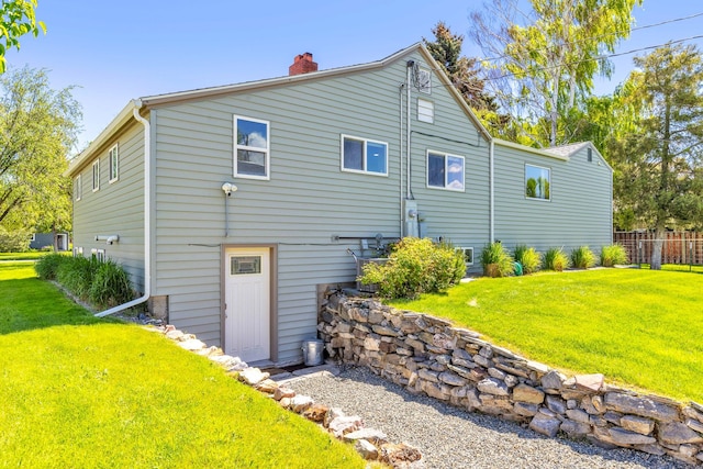 215 N Oak St, Townsend, MT 59644 - back of house featuring a chimney