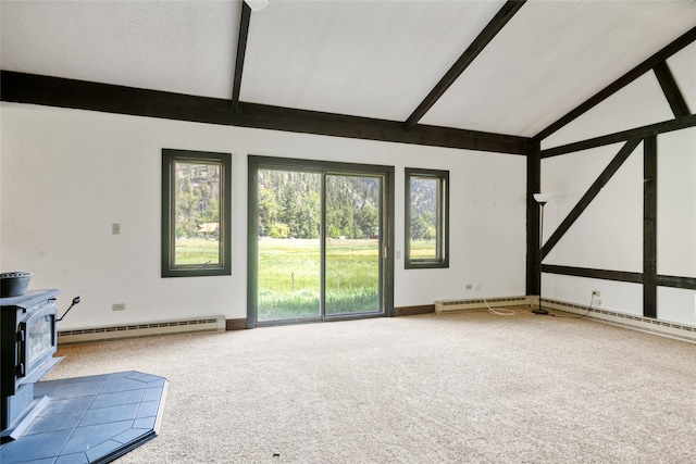 1165 Rock Creek Rd, Clinton, MT 59825 - unfurnished living room with a baseboard radiator, a wood stove, carpet flooring, beamed ceiling, and high vaulted ceiling