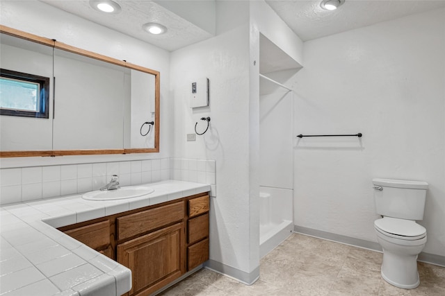 1165 Rock Creek Rd, Clinton, MT 59825 - full bath with vanity, a shower stall, and decorative backsplash