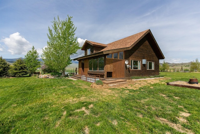 49 Redtail Hawk Rd, Mcallister, MT 59740 - back of property with a lawn