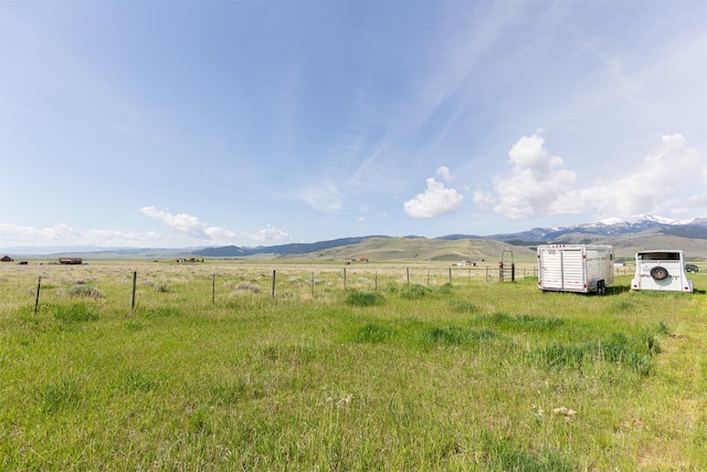 49 Redtail Hawk Rd, Mcallister, MT 59740 - view of yard featuring a view of rural / pastoral area and a mountain view