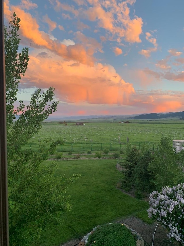 49 Redtail Hawk Rd, Mcallister, MT 59740 - yard at dusk featuring a view of countryside
