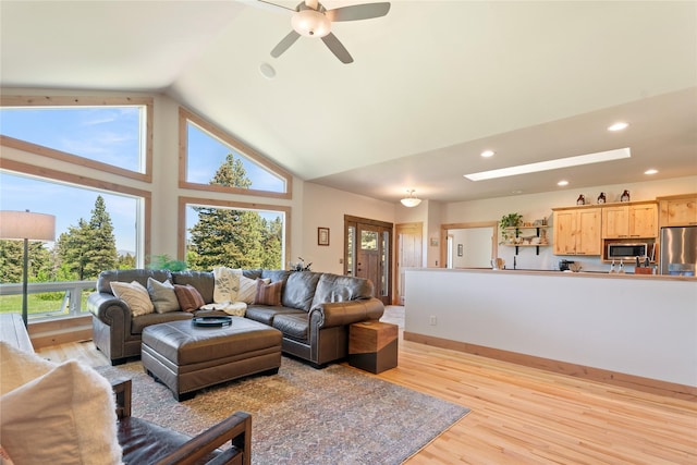 36 Lost Trl, Clancy, MT 59634 - living area featuring light wood-style floors, ceiling fan, high vaulted ceiling, and recessed lighting