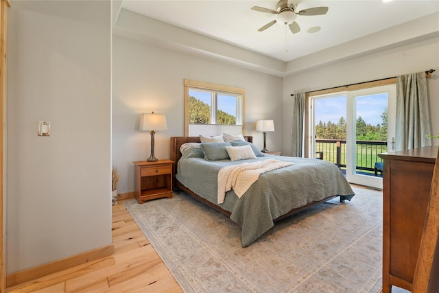 36 Lost Trl, Clancy, MT 59634 - bedroom featuring access to outside, light wood finished floors, baseboards, and a ceiling fan