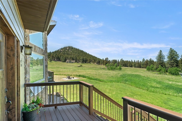36 Lost Trl, Clancy, MT 59634 - wooden terrace with a rural view, a yard, a mountain view, and a wooded view
