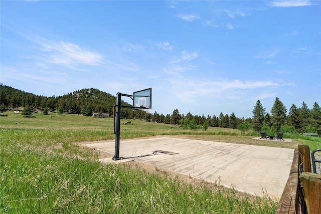 36 Lost Trl, Clancy, MT 59634 - view of sport court with a forest view