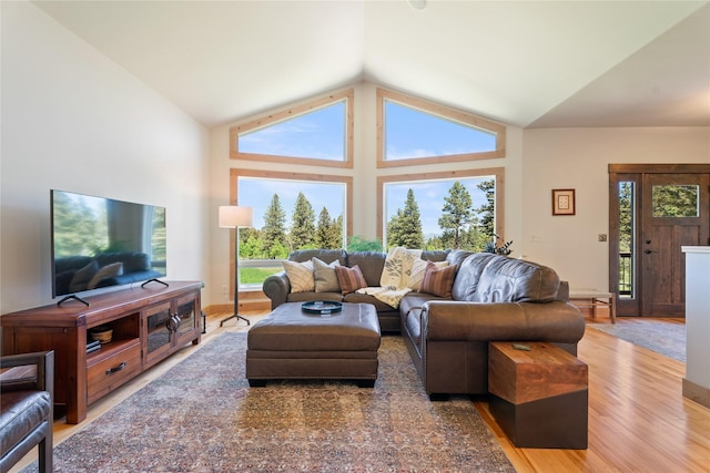 36 Lost Trl, Clancy, MT 59634 - living area featuring wood finished floors and lofted ceiling