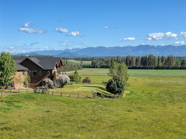 310 Jossie Ln, Kalispell, MT 59901 - mountain view featuring rural landscape and a pastoral area