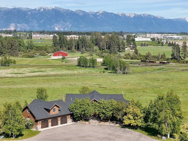 310 Jossie Ln, Kalispell, MT 59901 - mountain view with rural landscape and a pastoral area