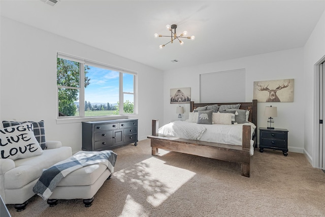 310 Jossie Ln, Kalispell, MT 59901 - bedroom with a chandelier, light colored carpet, and baseboards