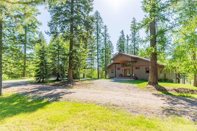 161 Hastings Trl, Columbia Falls, MT 59912 - view of front facade featuring a front lawn and driveway