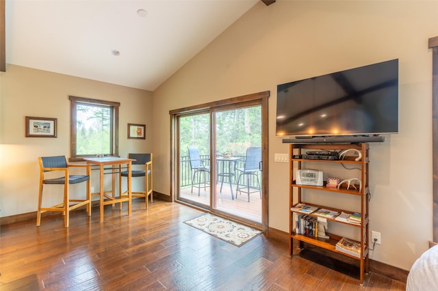 161 Hastings Trl, Columbia Falls, MT 59912 - dining area with baseboards, high vaulted ceiling, and wood finished floors