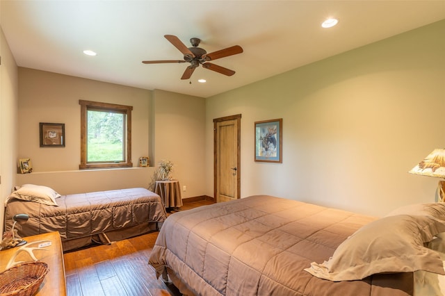 161 Hastings Trl, Columbia Falls, MT 59912 - bedroom with hardwood / wood-style floors, recessed lighting, and a ceiling fan