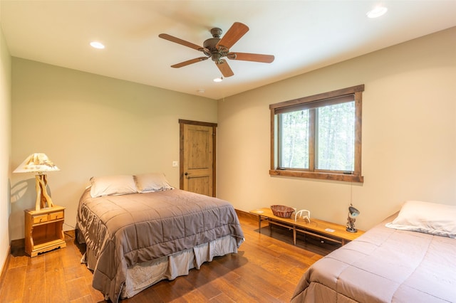 161 Hastings Trl, Columbia Falls, MT 59912 - bedroom with recessed lighting, wood finished floors, and a ceiling fan