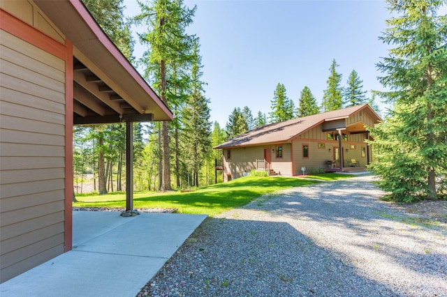 161 Hastings Trl, Columbia Falls, MT 59912 - view of green lawn with a patio area