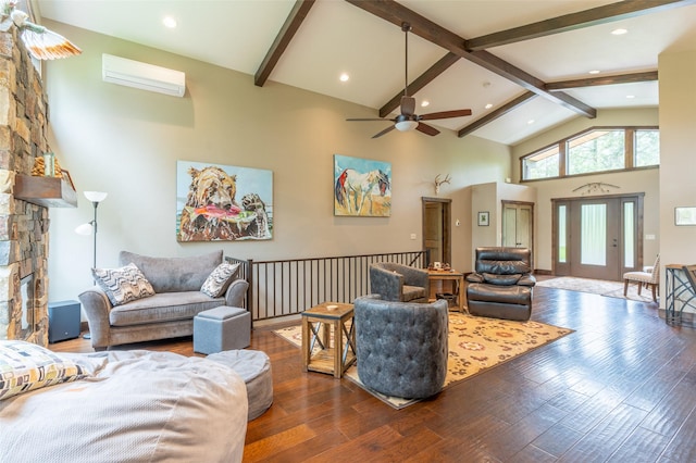 161 Hastings Trl, Columbia Falls, MT 59912 - living room with high vaulted ceiling, a wall unit AC, beam ceiling, a ceiling fan, and dark wood-type flooring