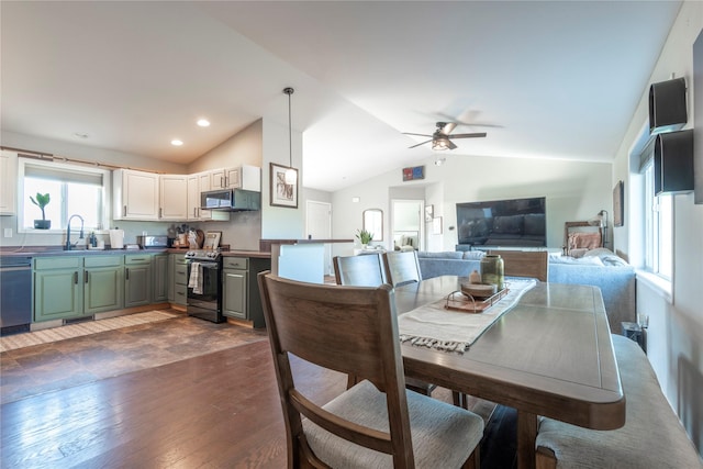 333 Darwin Rd, Helena, MT 59602 - dining space featuring vaulted ceiling, ceiling fan, dark wood-style flooring, and recessed lighting