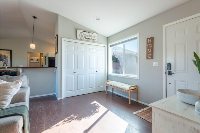 333 Darwin Rd, Helena, MT 59602 - living area with vaulted ceiling, wood finished floors, and baseboards
