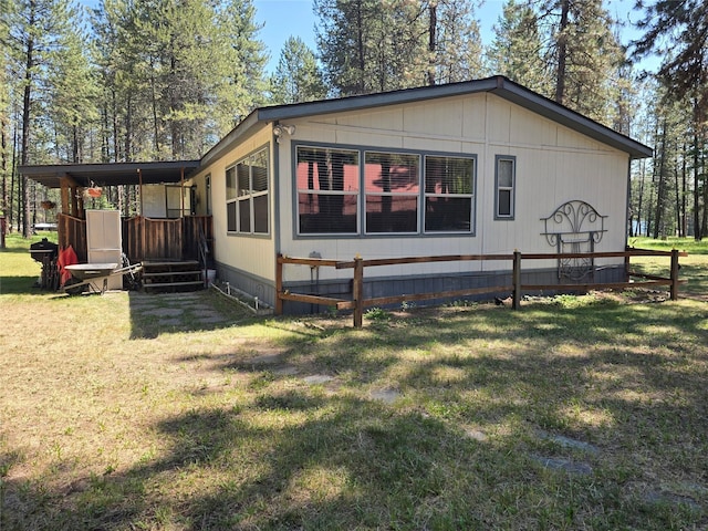 226 Powerline Way, Libby, MT 59923 - view of home's exterior with a yard