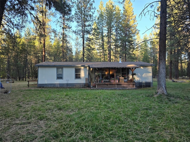 226 Powerline Way, Libby, MT 59923 - view of front of house featuring a front yard and a wooden deck