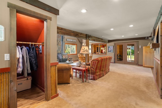29 Gold Coin Rd, Hall, MT 59837 - living room featuring a wood stove, recessed lighting, light carpet, and french doors