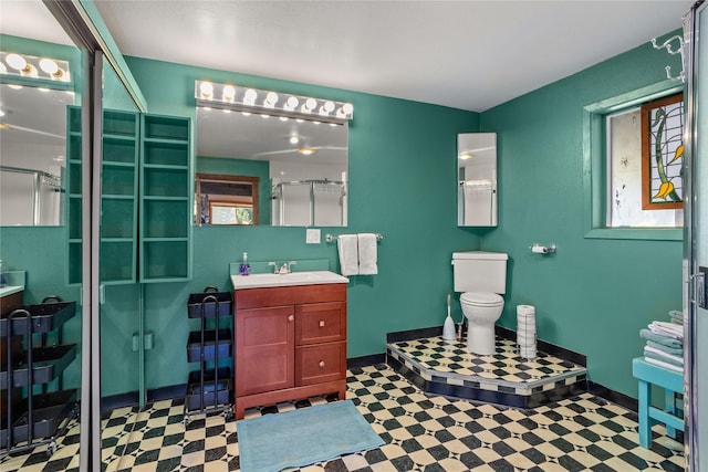 29 Gold Coin Rd, Hall, MT 59837 - full bath featuring tile patterned floors, vanity, a shower stall, and baseboards