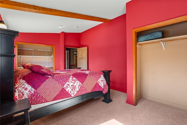 29 Gold Coin Rd, Hall, MT 59837 - carpeted bedroom with beam ceiling, a closet, and baseboards