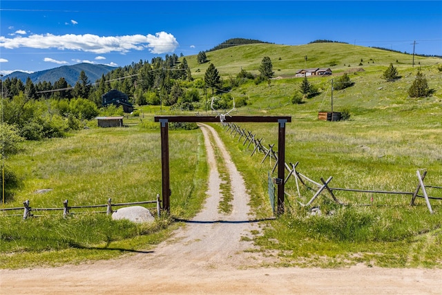 29 Gold Coin Rd, Hall, MT 59837 - mountain view featuring rural landscape and a pastoral area
