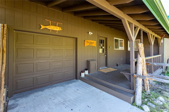 29 Gold Coin Rd, Hall, MT 59837 - view of exterior entry with a garage and driveway
