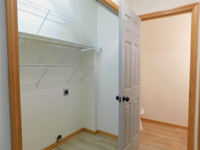 1960/1962 Greatview Dr, Kalispell, MT 59901 - washroom with light wood finished floors, electric dryer hookup, and baseboards
