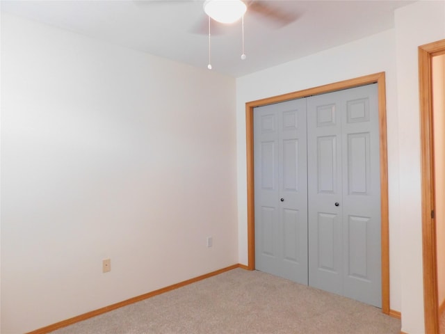 1960/1962 Greatview Dr, Kalispell, MT 59901 - unfurnished bedroom with light carpet, a closet, baseboards, and ceiling fan