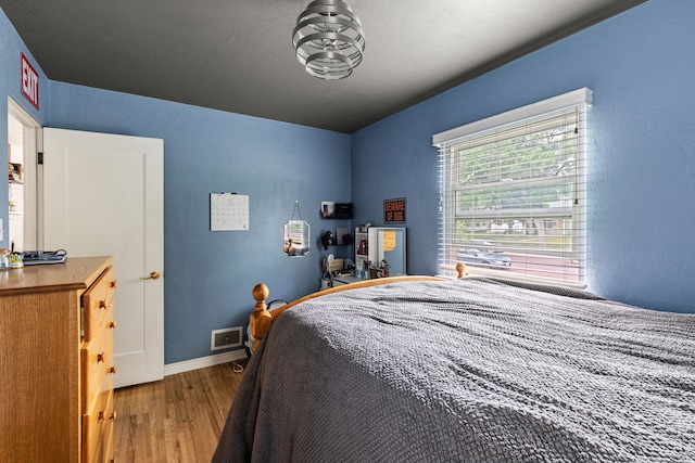 2713 5th Ave S, Great Falls, MT 59405 - bedroom featuring wood finished floors and baseboards