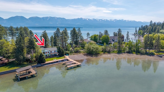37817 Kings Point Rd, Polson, MT 59860 - water view with mountains and a dock