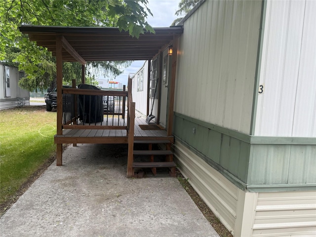 10011 Bitterroot Gtwy Unit 3, Lolo, MT 59847 - wooden terrace featuring grilling area