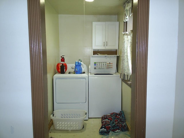 619 E Broadway St, Helena, MT 59601 - laundry area featuring separate washer and dryer and cabinet space
