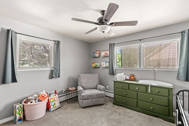122 22nd St S, Great Falls, MT 59401 - bedroom featuring baseboard heating, carpet floors, and ceiling fan