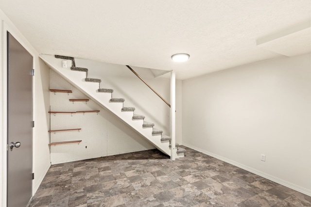 122 22nd St S, Great Falls, MT 59401 - finished below grade area with stone finish floors, stairway, and baseboards