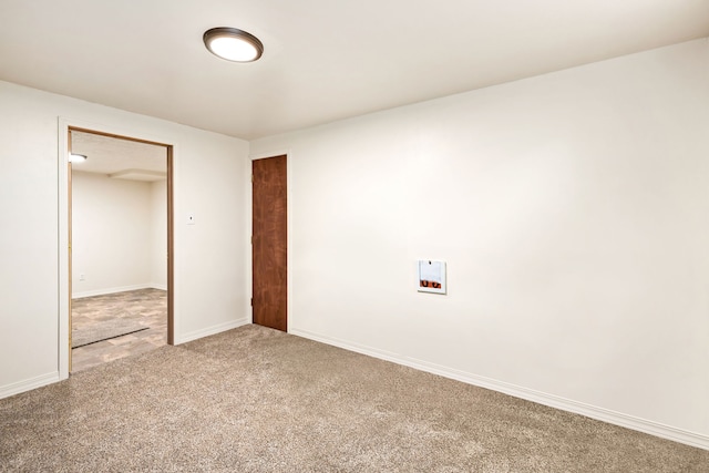 122 22nd St S, Great Falls, MT 59401 - unfurnished bedroom featuring light carpet, a closet, and baseboards