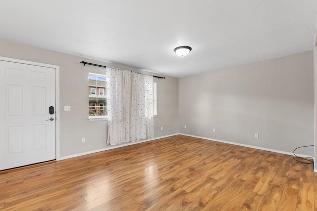 8 Mitchell Way, Columbia Falls, MT 59912 - spare room with light wood finished floors and baseboards