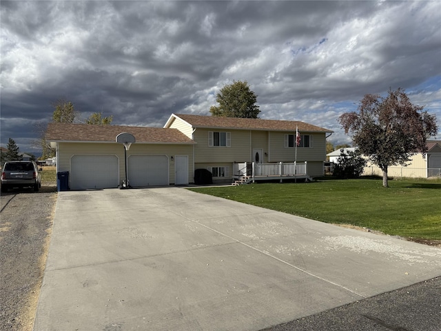 2720 Bandera Dr, East Helena, MT 59635 - split foyer home with a garage, a front yard, and driveway