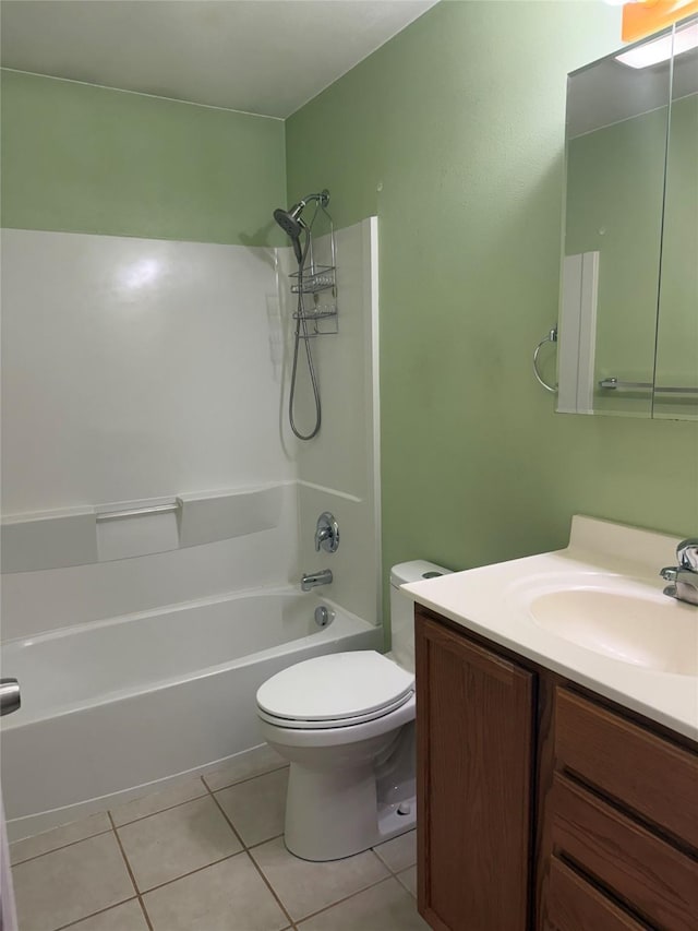 2720 Bandera Dr, East Helena, MT 59635 - bathroom featuring vanity, tile patterned floors, toilet, and shower / washtub combination
