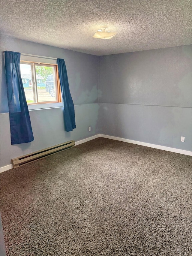 2720 Bandera Dr, East Helena, MT 59635 - empty room with baseboard heating, carpet, a textured ceiling, and baseboards