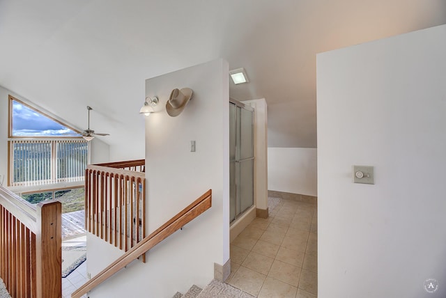199 Mountain View Trl, White Sulphur Springs, MT 59645 - hall with vaulted ceiling, an upstairs landing, light tile patterned floors, and baseboards