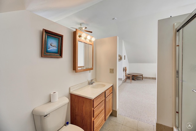 199 Mountain View Trl, White Sulphur Springs, MT 59645 - bathroom with vanity, toilet, an enclosed shower, ceiling fan, and tile patterned floors