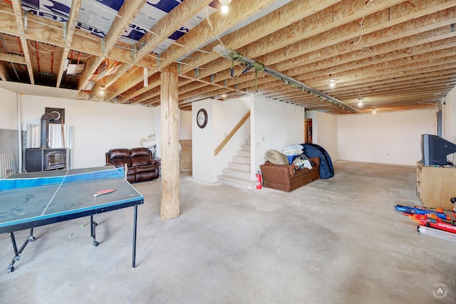 199 Mountain View Trl, White Sulphur Springs, MT 59645 - unfinished below grade area with a wood stove and stairway